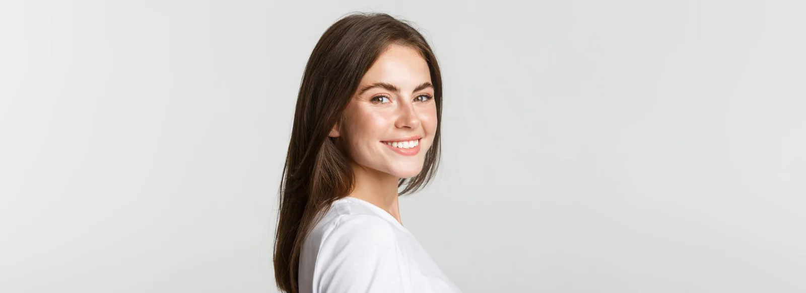 Smiling young woman with a bright, natural smile