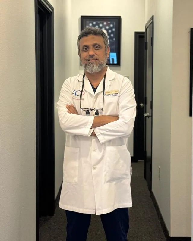 Dr. Salman Lakhani, prosthodontist, at Soft Touch Dental in Plano